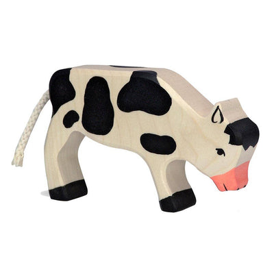 Holztiger Grazing Black Cow